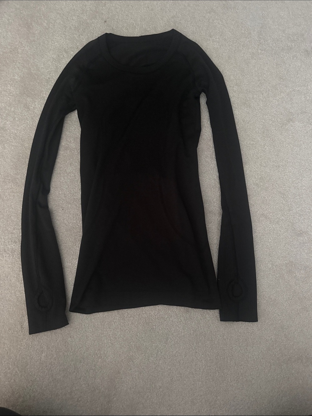 Lululemon black swiftly tech long sleeve shirt hip length.